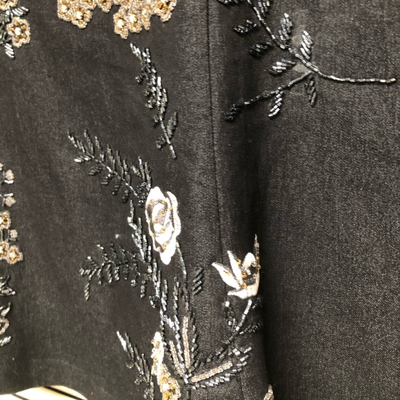 Dark denim stud and embellished skirt.  A-line - Picture 11 of 12